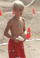 Blond boy with red shorts