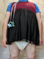 I have always wanted a sissy diaper peeking out under a skirt