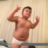 cute chubby boy dancing