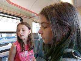 Sweet sisters in train