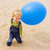 Little Boy with Big Balloons
