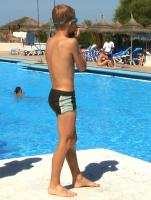 Blond Boy At The Pool