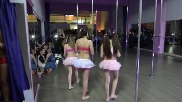 Young Pole Dancers 02 - Three cuties and a crowd