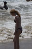 Redhead teen at the beach - candid