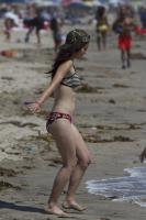 Candid - Cute young teen in her hat and bikini