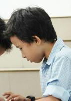 16 - an asian minor boy - open -