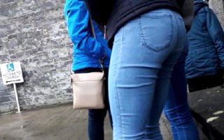 Candid teen sisters in blue jeans.