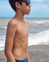 Cute boy Vitor at the beach 2022