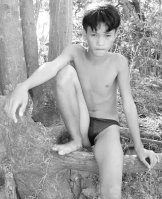 Asian boys in thongs on the beach (black & white)